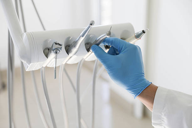 Professional Invisalign Clear Aligners technician working in Morrisville, VT